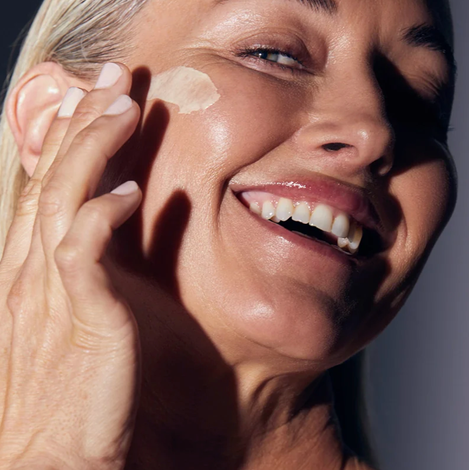 Mature woman using Synergie Skin ReClaim Moisturiser - anti-ageing moisturiser for firmer skin Australia