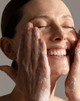 Woman cleansing with Synergie Skin Ultra Cleanse - gentle pH balanced cleanser for all skin types Australia