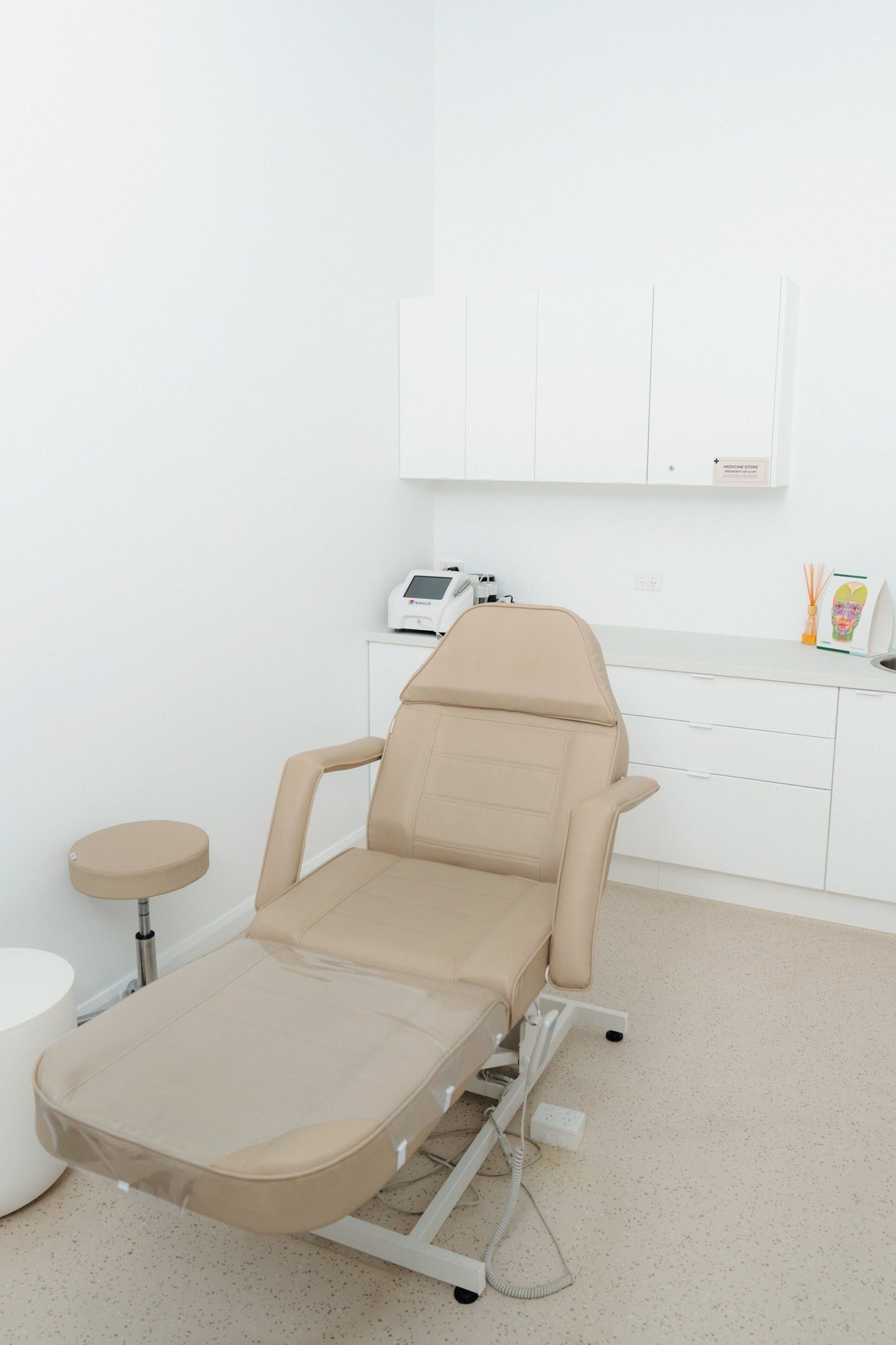 Comfortable clinic chair in modern aesthetics room